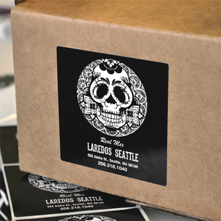 Black and white skull design label on a cardboard box